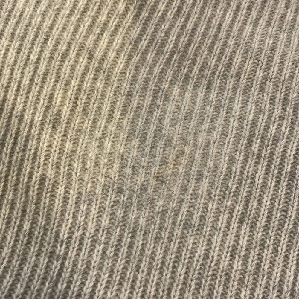 Gray crewneck sweater with lace up detail